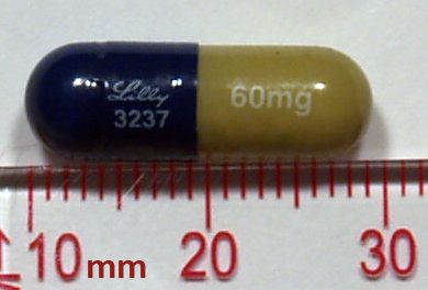 Cymbalta (duloxetine) 60 mg capsule beside a ruler